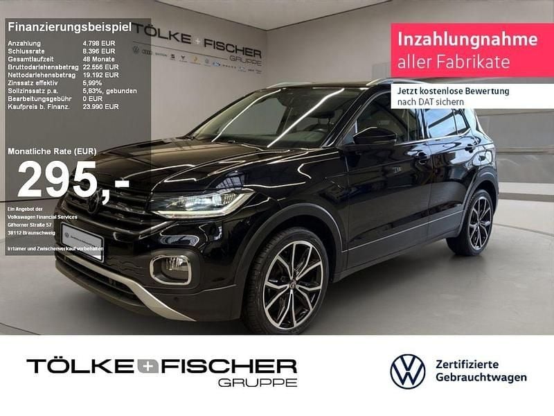 Deep black perleffekt (metallic) Gebraucht 2021 VW T-Cross Style SUV | 22.989 € (Etwas zu teuer) - Bild 1/4