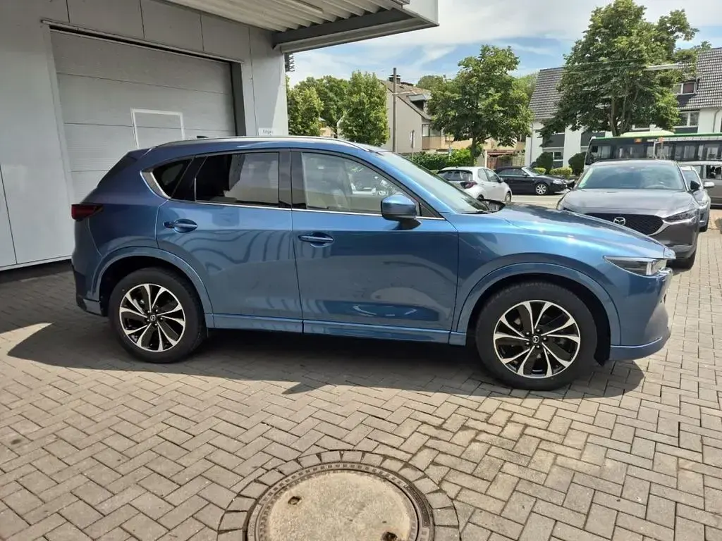 Gebraucht Mazda CX-5 184 PS (135 kW) 2022 Blau SUV