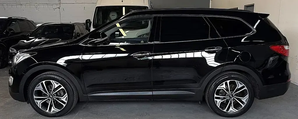 Gebraucht Hyundai Grand Santa Fe Premium 197 PS (144 kW) 2014 Schwarz SUV