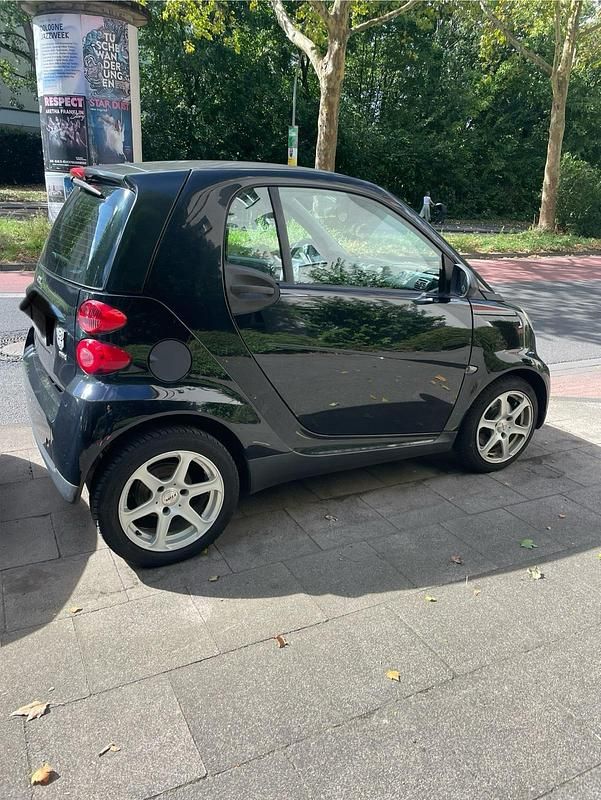 Schwarz Gebraucht 2010 Smart ForTwo Coupé Pure Coupé | 2.999 € (Guter Preis) - Bild 1/4