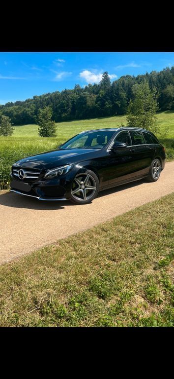 Schwarz Gebraucht 2015 Mercedes C250 AMG line Limousine | 14.490 € (Superpreis) - Bild 1/4