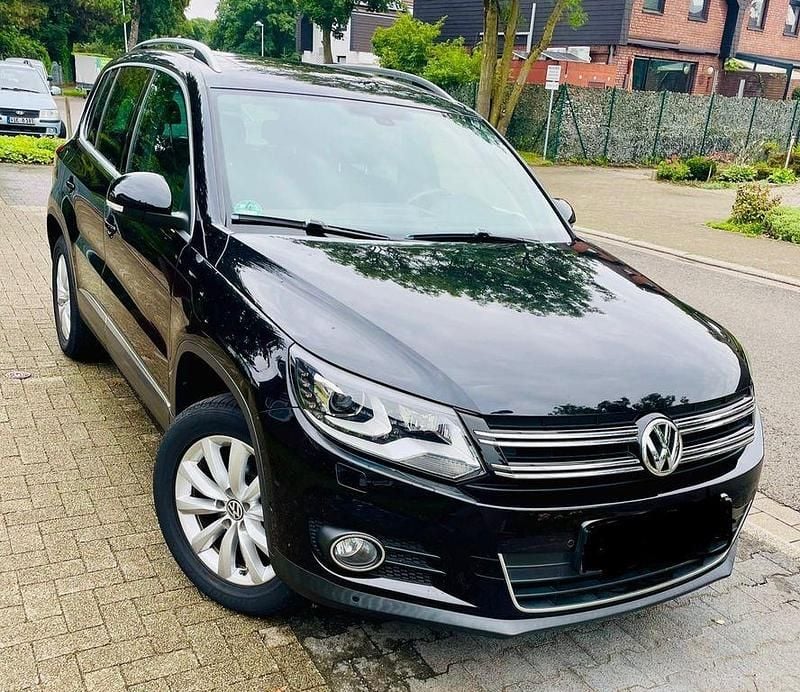 Schwarz Gebraucht 2012 VW Tiguan Trendline SUV | 11.000 € - Bild 1/4