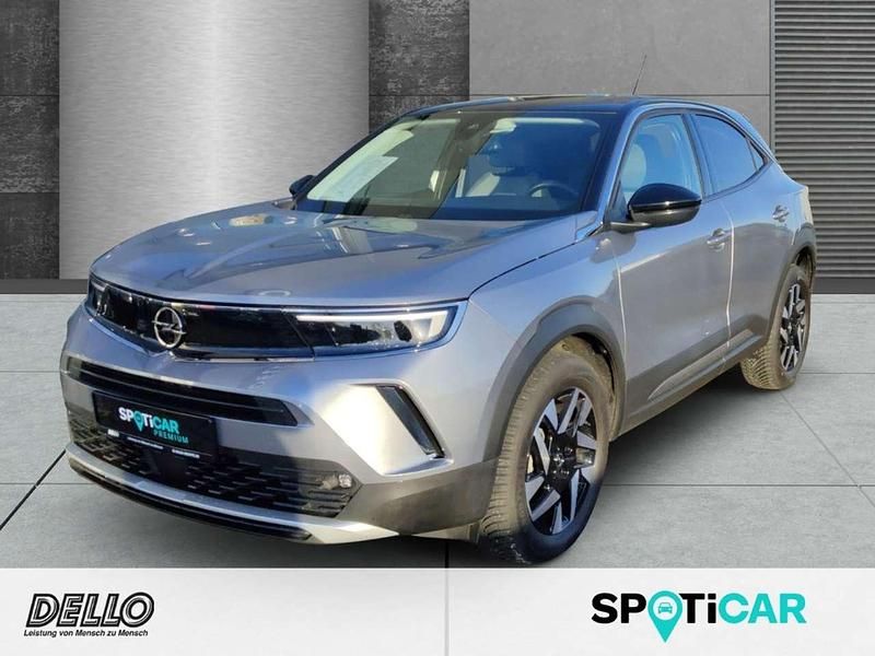 Gebraucht Opel Mokka Elegance 131 PS (96 kW) 2022 Kontrast grau/quarz silber SUV