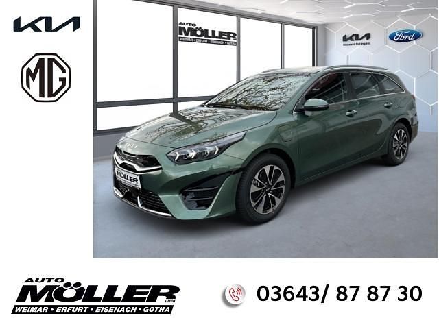 Experience green metallic Gebraucht 2024 Kia Ceed Sportswagon Comfort Kombi | 28.889 € (Teuer) - Bild 1/4