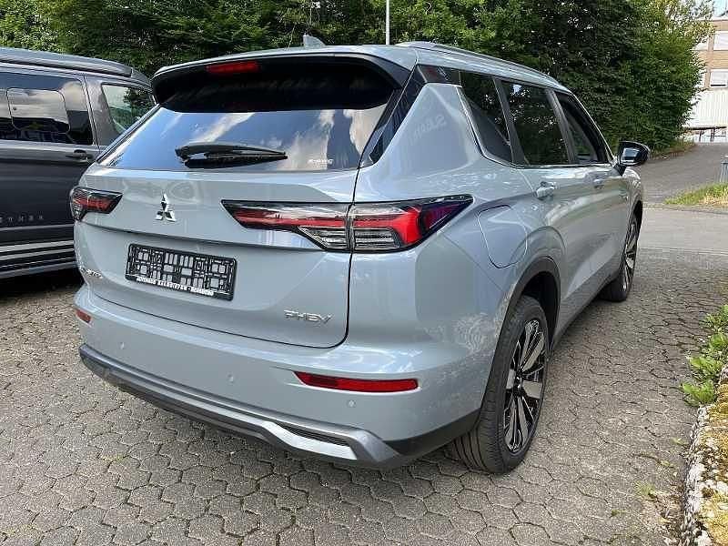 Gebraucht Mitsubishi Outlander P-HEV Edition 306 PS (225 kW) 2025 Mondsteingrau SUV