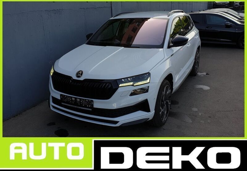 Moonweiss metallic Gebraucht 2022 Skoda Karoq SportLine SUV | 23.370 € - Bild 1/4