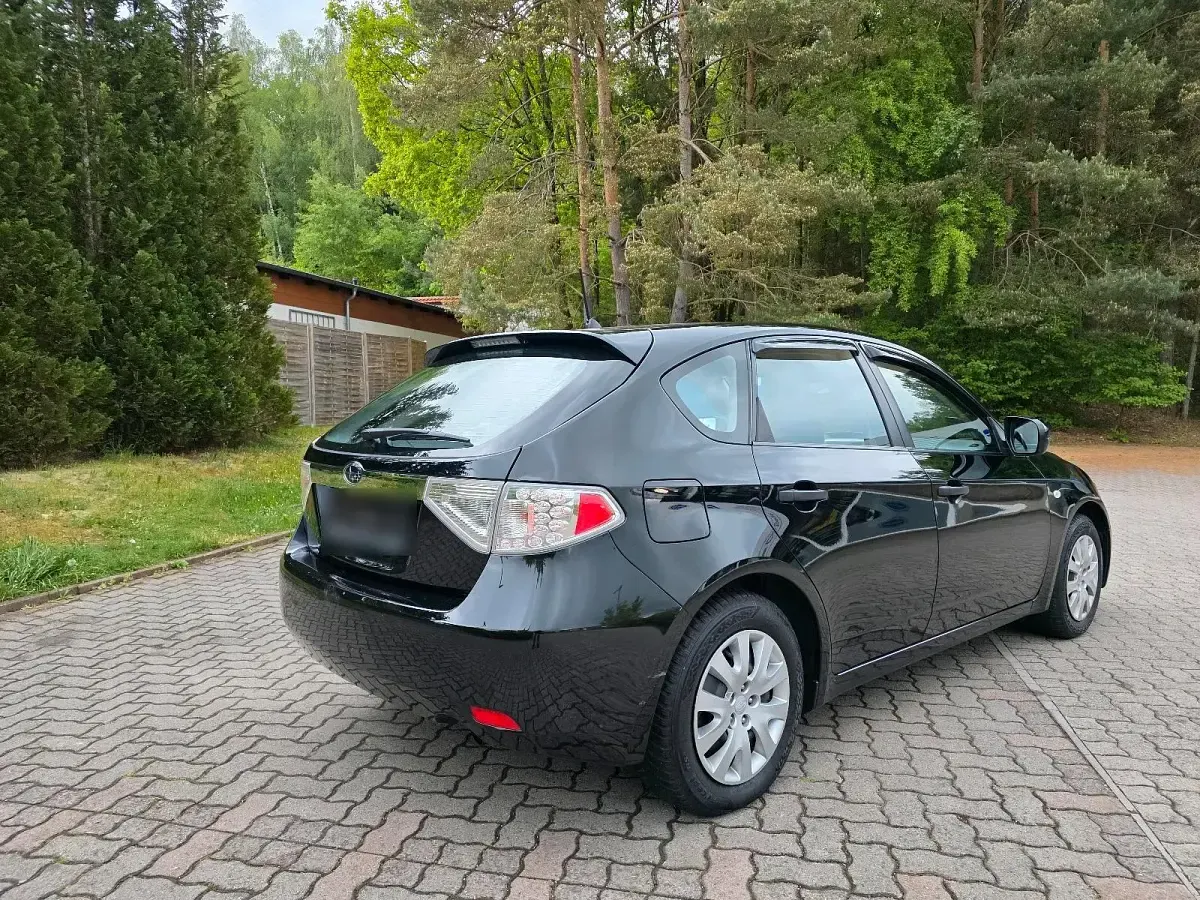 Gebraucht Subaru Impreza 107 PS (78 kW) 2009 Schwarz Kleinwagen
