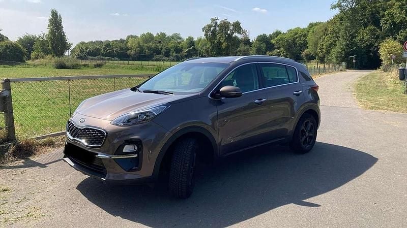 Braun Gebraucht 2019 Kia Sportage DREAM-TEAM Edition SUV | 15.500 € (Guter Preis) - Bild 1/4