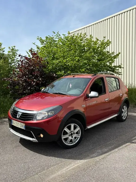 Second-hand Dacia Sandero Stepway 88 CP (64 kW) 2011 Roșu Berlinǎ