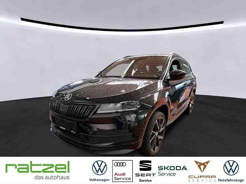 Schwarz Gebraucht 2022 Skoda Karoq SportLine SUV | 28.890 € (Etwas zu teuer) - Bild 1/4