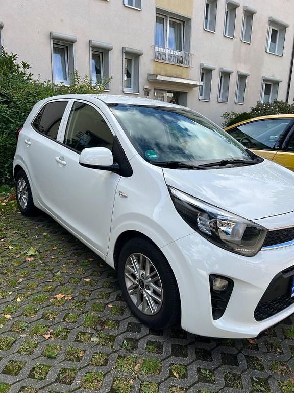 Weiß Gebraucht 2022 Kia Picanto DREAM-TEAM Edition Kleinwagen | 12.299 € (Fairer Preis) - Bild 1/4