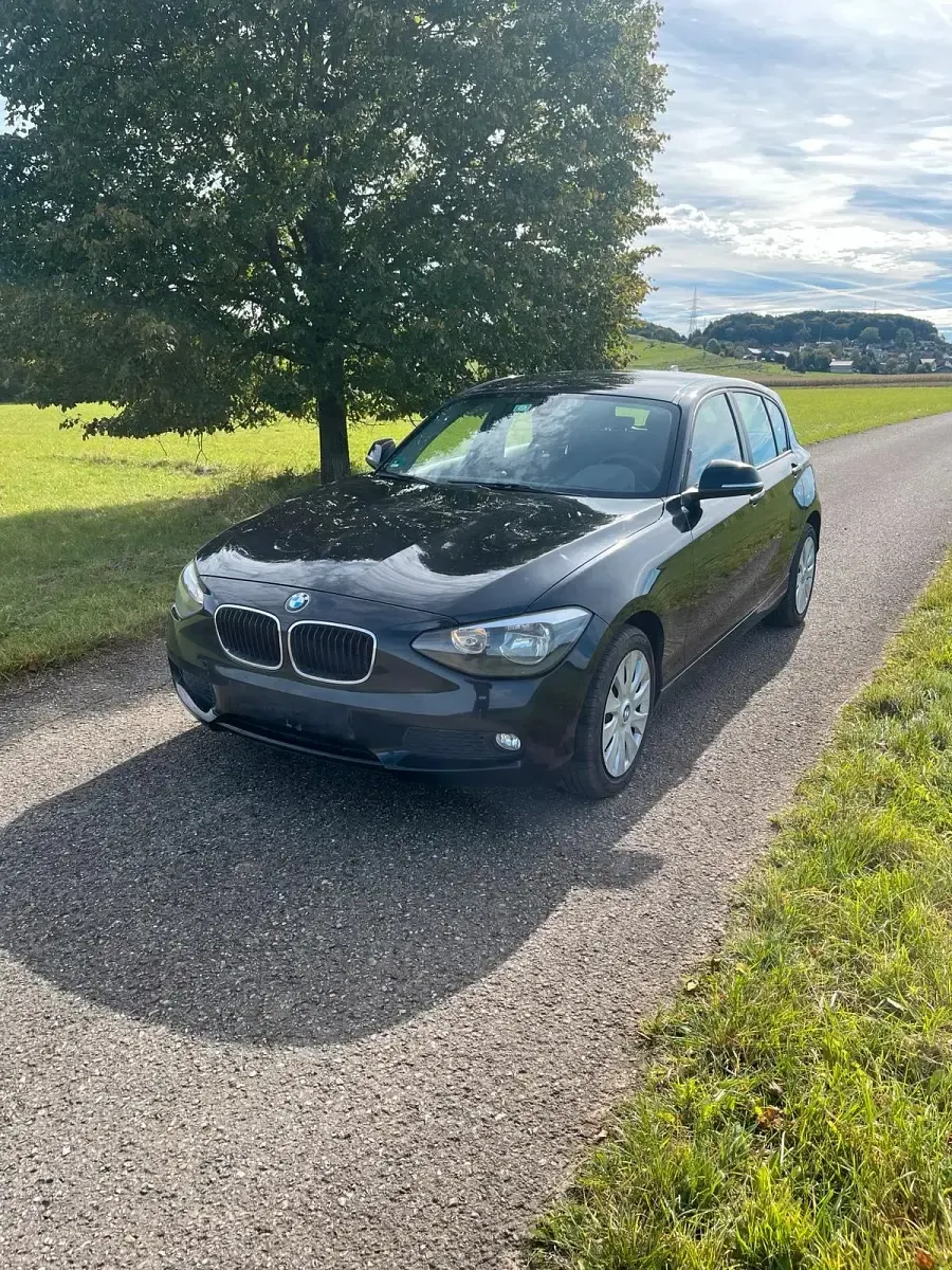 Second-hand BMW 116 136 CP (100 kW) 2011 Negru Hatchback