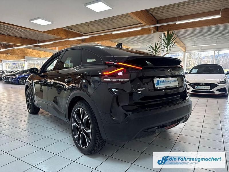 Gebraucht Citroën e-C4 Shine 100 kW (136 PS) 2023 Schwarz Limousine
