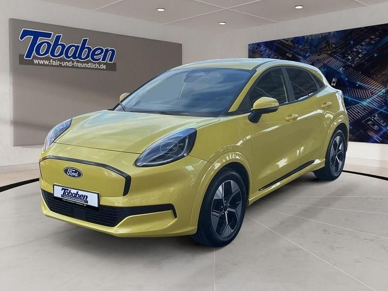Electric yellow premium metall Neu 2025 Ford Puma Gen-E SUV | 36.950 € - Bild 1/4