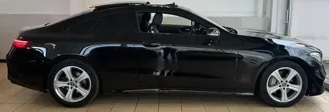 Gebraucht Mercedes E220 AMG line 194 PS (142 kW) 2018 Obsidianschwarz Coupé