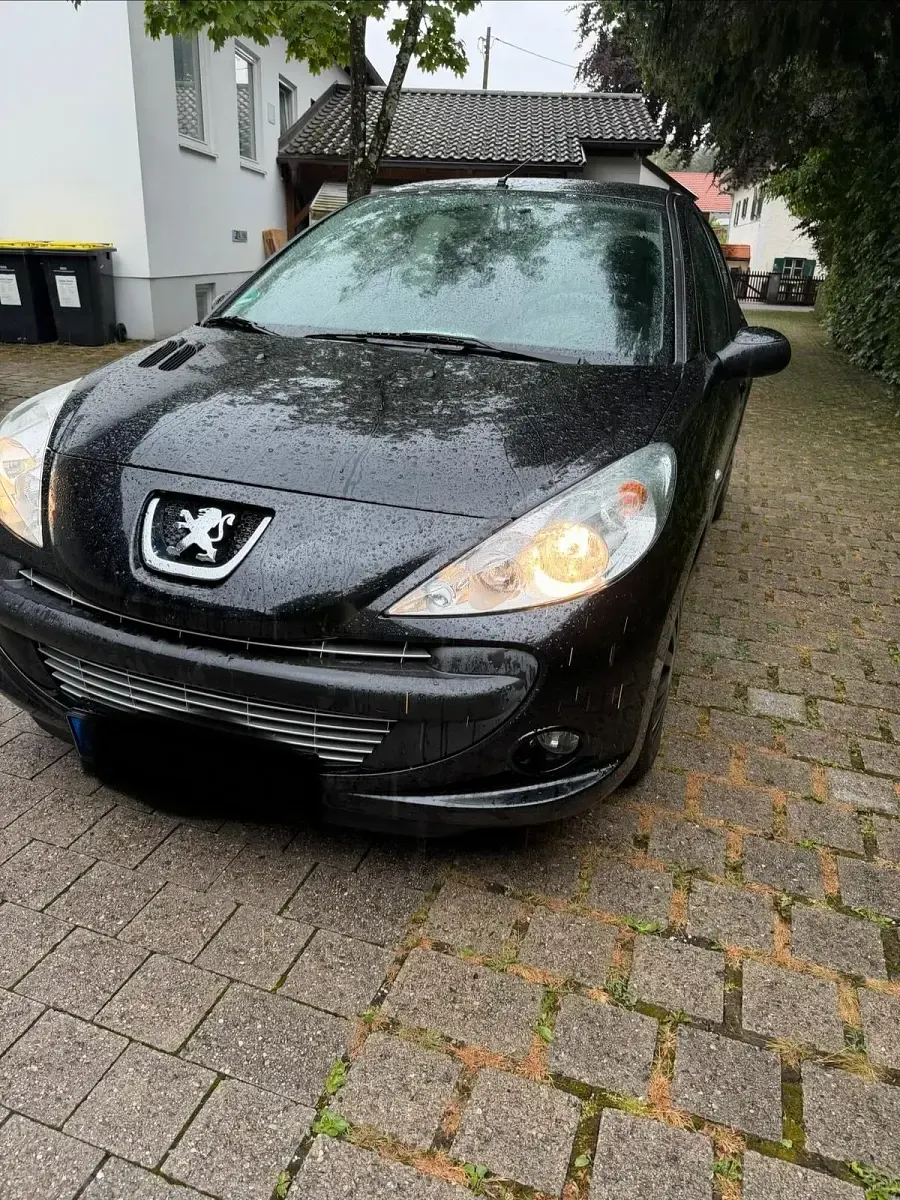 Gebraucht Peugeot 206 75 PS (55 kW) 2009 Schwarz Kleinwagen