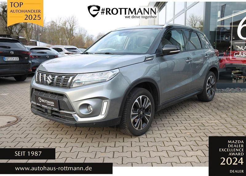 Grau Gebraucht 2023 Suzuki Vitara Comfort+ SUV | 17.490 € (Superpreis) - Bild 1/4