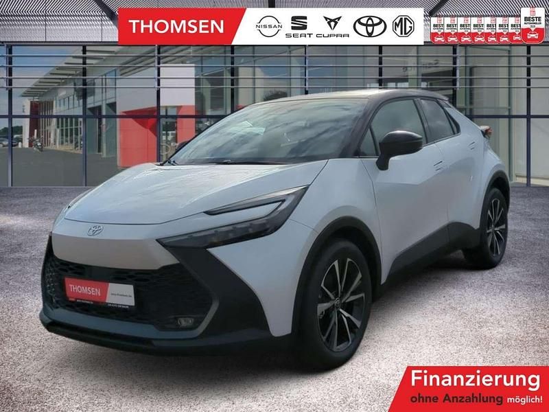 Platinum weiss perleffekt / dach schwarz Gebraucht 2024 Toyota C-HR Team SUV | 32.485 € (Superpreis) - Bild 1/3