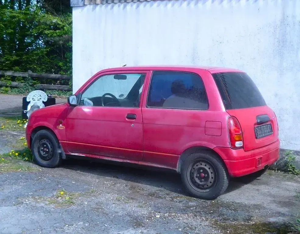 Gebraucht Daihatsu Cuore 56 PS (41 kW) 1998 Rot Kleinwagen