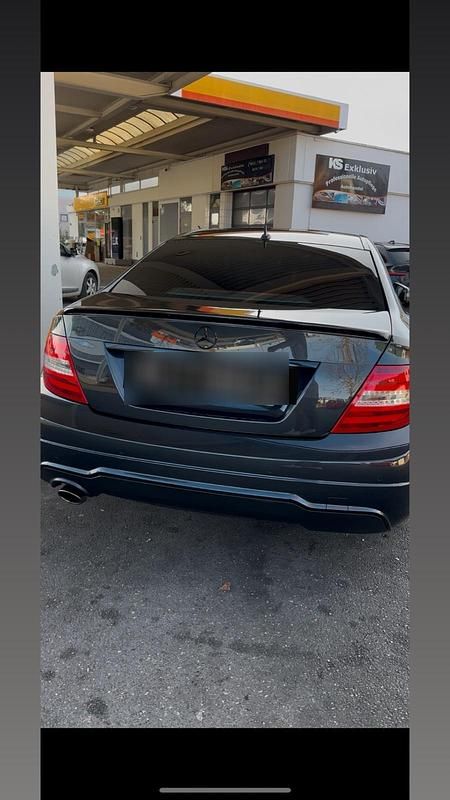 Schwarz Gebraucht 2014 Mercedes C250 Edition Coupé | 9.900 € - Bild 1/4