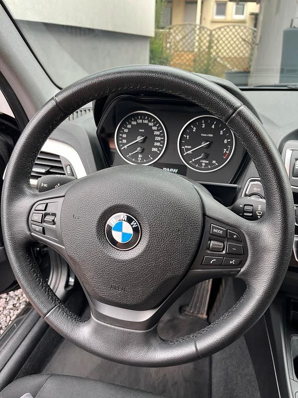 Używany BMW 116 109 KM (80 kW) 2016 Czarny Hatchback