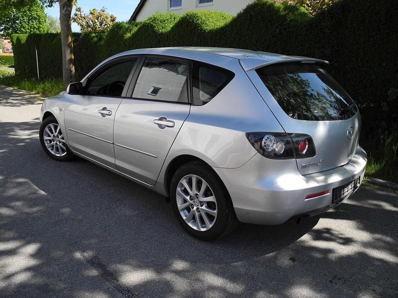 Second-hand Mazda 3 Inclusive 105 CP (77 kW) 2009 Argintiu Berlinǎ