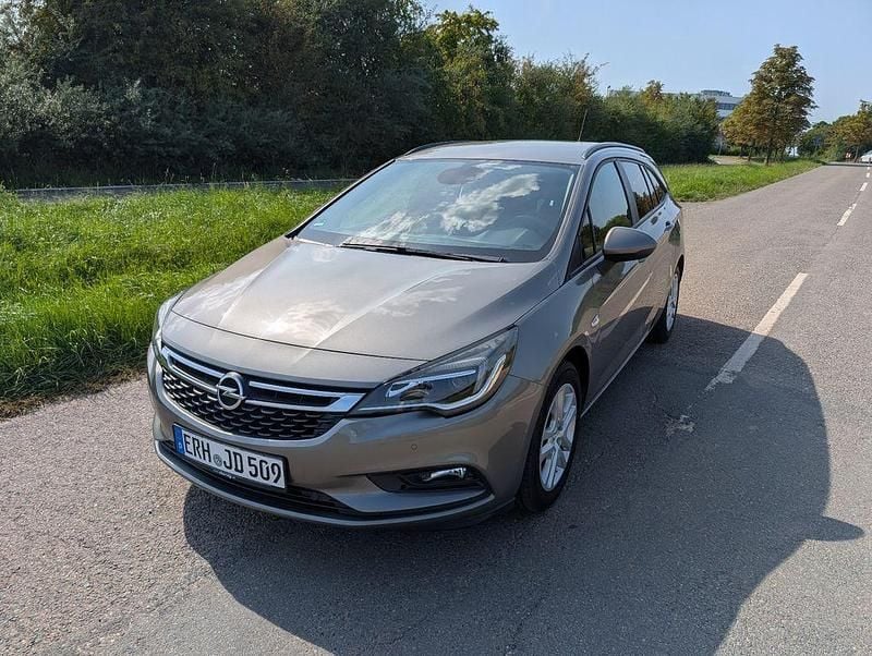 Grau Gebraucht 2016 Opel Astra Active Kombi | 7.900 € (Fairer Preis) - Bild 1/4