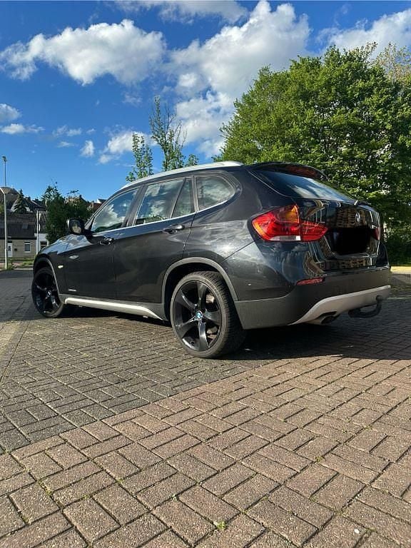 Second-hand BMW X1 204 CP (150 kW) 2009 Negru SUV