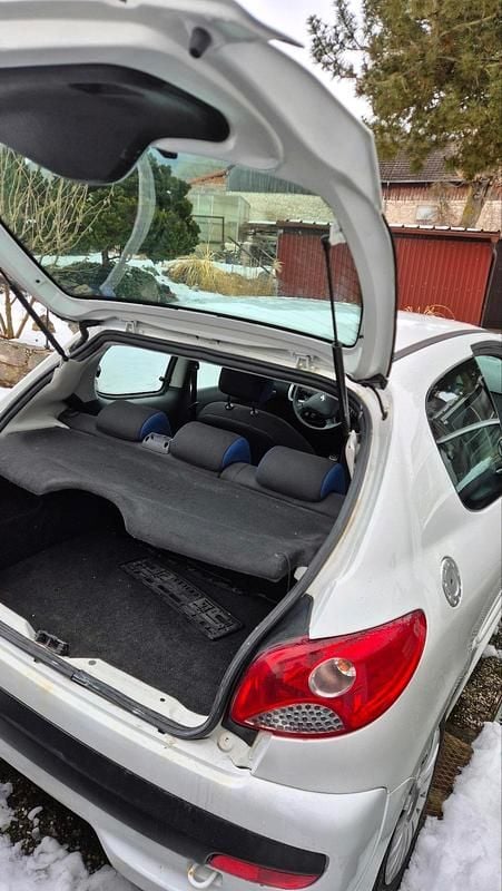 Gebraucht Peugeot 206+ 73 PS (53 kW) 2012 Weiß Kleinwagen