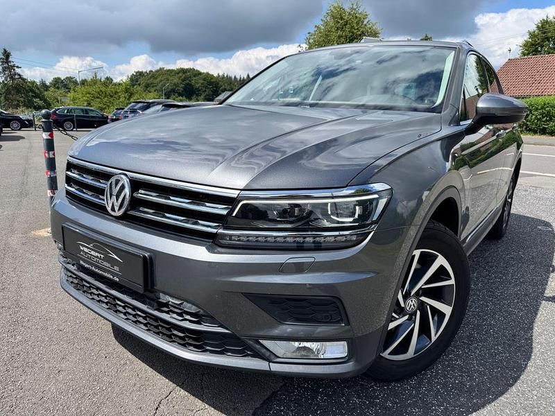 Grau Gebraucht 2017 VW Tiguan Sound SUV | 18.997 € (Guter Preis) - Bild 1/4