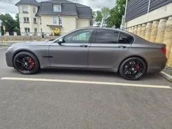 Grau Gebraucht 2013 BMW 750 M Sport Limousine | 23.900 €
