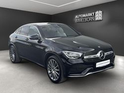 Obsidianschwarz (metallic) Gebraucht 2021 Mercedes GLC300e AMG Coupé | 44.280 € (Fairer Preis)