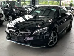 Schwarz unilack Gebraucht 2016 Mercedes C220 AMG line Coupé | 25.990 € (Teuer)