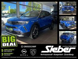 Lackierung voltaic blue met/ty Gebraucht 2023 Opel Mokka-e Elegance SUV | 20.990 € (Fairer Preis)
