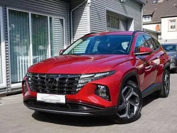Sunset red / mic Gebraucht 2022 Hyundai Tucson Basis SUV | 26.970 € (Guter Preis)
