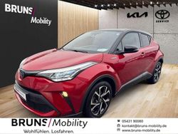 Emotional red 2 (3u5)/ black ( Gebraucht 2022 Toyota C-HR+ SUV | 24.980 € (Fairer Preis)