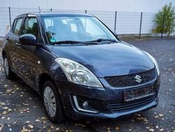 Grau Gebraucht 2015 Suzuki Swift Club Limousine | 8.400 € (Fairer Preis)
