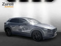 Machine gray Gebraucht 2024 Mazda CX-30 Nagisa SUV | 29.580 € (Fairer Preis)
