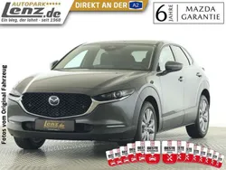 Machine gray Gebraucht 2024 Mazda CX-30 Exclusive-Line SUV | 27.450 € (Guter Preis)
