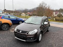 Braun Gebraucht 2014 Suzuki SX4 Style Limousine | 6.950 € (Teuer)