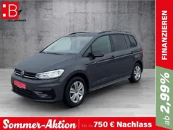 Grau Gebraucht 2024 VW Touran Pro Van / Kleinbus | 36.950 € (Fairer Preis)