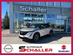 Warm silver metallic/dach und Gebraucht 2024 Nissan Ariya Evolve SUV | 45.700 € (Superpreis)