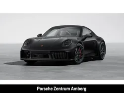 Tiefschwarzmetallic Gebraucht 2024 Porsche 911 Carrera 4 GTS Coupé | 189.990 €