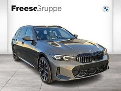 Grau Gebraucht 2024 BMW 330e Performance Kombi | 61.399 €
