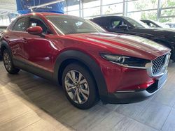 Magmarot metallic Gebraucht 2024 Mazda CX-30 Exclusive-Line SUV | 31.690 €