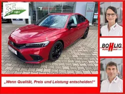 Premium crystal rot metallic Gebraucht 2024 Honda Civic Hybrid Limousine | 35.570 €