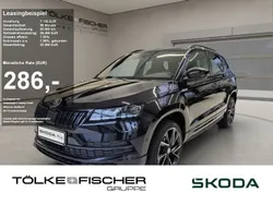 Schwarz magic perleffekt (metallic) Gebraucht 2022 Skoda Karoq SportLine SUV | 28.640 € (Teuer)