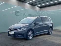 Grau Gebraucht 2024 VW Touran Highline Van / Kleinbus | 37.545 € (Fairer Preis)
