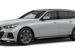 Grau Gebraucht 2024 BMW i5 Comfort Edition Kombi | 67.408 €