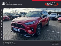 Karminarot metallic / dach schwarz Gebraucht 2023 Toyota RAV4 Hybrid Sport SUV | 55.500 €